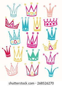 Set of cute cartoon crowns. Hand drawing vector background. Pastel color. Vector illustration.