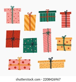 Set of cute Christmas gift boxes with ribbon. New Year presents. Winter holiday vector illustration in a flat style.