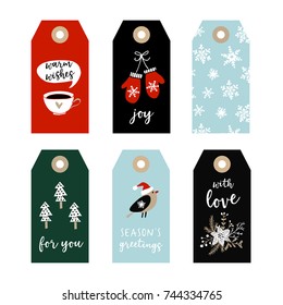 Set of cute Christmas gift tags, labels with bird, gloves, snowflakes and Christmas trees. Hand drawn illustrations, flat design. Isolated vector objects.