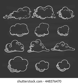 Set of cute clouds using doodle art on chalkboard background