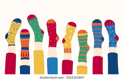 Set of cute decorated Christmas socks in the row isolated on white background. Merry Christmas socks.