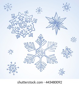 Set of cute eve natal icy asterisk template for wrapping nativity design. Freehand outline ink hand drawn sign sketchy in scribble retro style pen on paper with space for text on light blue sky 