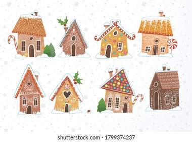 Set of cute gingerbread houses with christmas decorations on white background