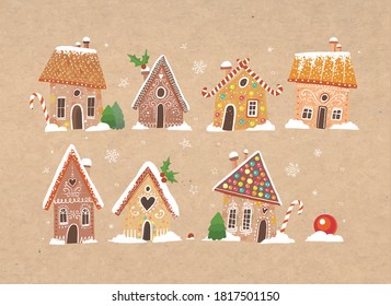 Set of cute gingerbread houses with christmas decorations on brown craft paper background.