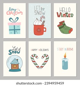 Set of cute greeting cards for winter holidays. Posters, postcards for Christmas, New Year. Hand drawn symbols of winter holidays: snow globe, candle, gift box, knitted socks, candy canes