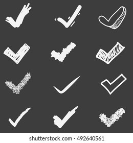 Set of cute hand drawn check marks. Doodle style sketching. Vector illustration.