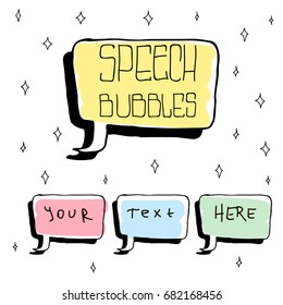 Set of Cute Hand Drawn Speech Bubbles in Doodle Style. Colorful in white sparks background.