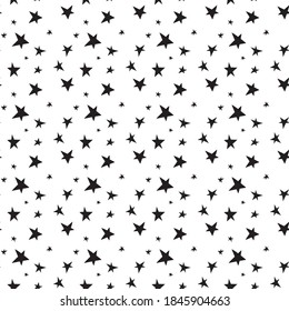 Un juego de tiernos estrellas dibujadas a mano. Resumen de un patrón sin fisuras vectorial con estrellas negras.