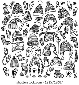 Set of cute hand-drawn hats, mitten and socks isolated on white background. Winter background. 