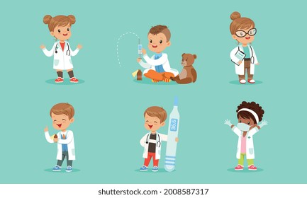 Set of Cute Kids in White Coats Playing Doctors, Cheerful Little Boys and Girls Examining and Treating their Patients with Medical Tools Cartoon Vector Illustration