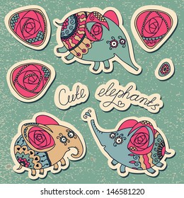 Set of cute little elephants and roses with ornaments. Vector illustration.