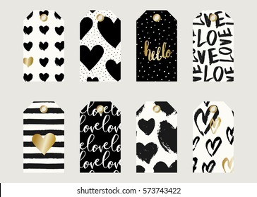 A set of cute and modern gift tag designs for St. Valentine's Day. Hand drawn elements and lettering designs in black, white and gold.