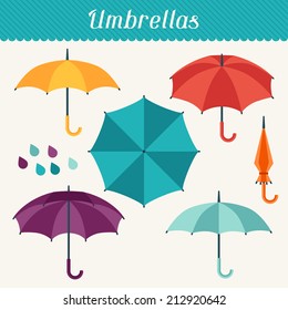 Set of cute multicolor umbrellas in flat design style.