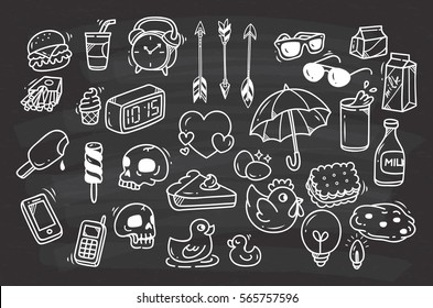 Set of cute random doodle on chalkboard background