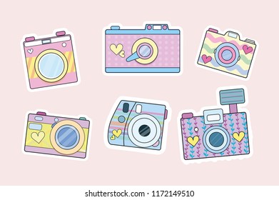 Set of cute retro cameras isolated on blush pink background. Vector illustration,