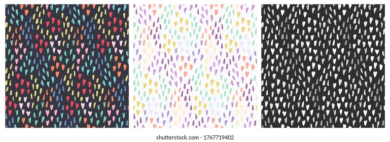 Set of cute seamless patterns with mess of colorful hearts and dotted elements. Lovely simple vector textures with doodle hand drawn shapes for Valentines wrapping paper, surface, textile, background