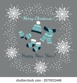A set of cute winter accessories - socks, mittens, hats with ornaments. Seasonal woolen clothes for warm walks. Snowflakes and inscriptions Merry Christmas and Happy New Year. Vector illustration.
