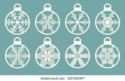 Set of cutout balls with snowflake Laser cut pattern for christmas cards, design elements, scrapbooking Xmas tree decor Laser or plotter cutting printing serigraphy or wood carving Vector illustration