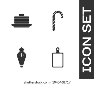 Set Cutting board, Stack of pancakes, Pastry bag and Christmas candy cane icon. Vector