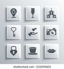 Set Cylinder hat, Smiling lips, Photo camera, Heart hand, Castle the shape of heart, Key, Wedding rings and Church building icon. Vector