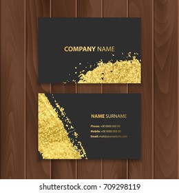 Set of dark visit cards decoration with gold brushes, located on a wooden substrate vector eps 10