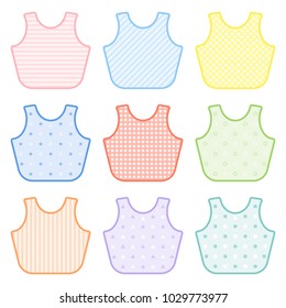 Set with decorated baby bibs in pastel colors. Vector illustration isolated on white background. Baby feeding equipment