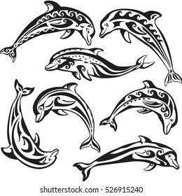 Set of decorated dolphins on black