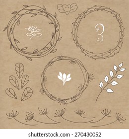 Set decoration. Consists of leaves, twigs, buds, wreaths. Background kraft.