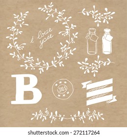 Set decoration. Consists of leaves, twigs, buds, wreaths. Kraft  background.