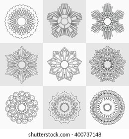 Set of decorative design elements isolated on grey background.  Flowers, snowflakes, abstract floral pattern, star, sun. Vector logo,  sign. Floral ornament. Coloring Design template