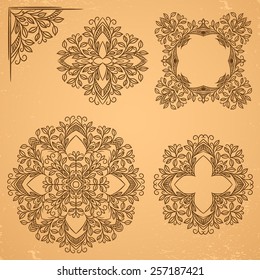Set of decorative floral elements. Corner element and circle rosette.