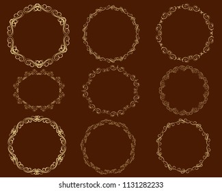 Set of decorative florish gold frames on the dark background.