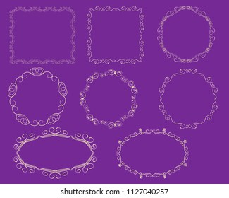 Set of decorative flourish gold frames on the dark background.