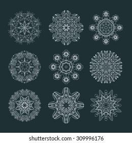 Set of decorative isolated rosettes-snowflakes