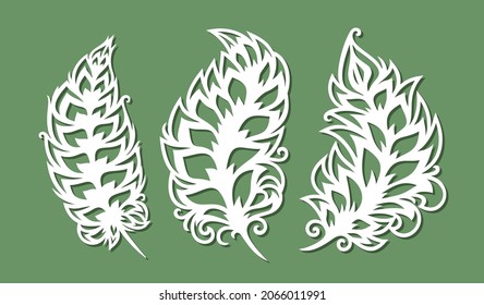 Set of decorative leaves, feathers, quills. White carved elements on a green background. Template for plotter laser cutting of paper, plywood, metal engraving, wood carving, cnc. Vector illustration. 