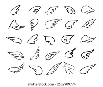 set of decorative ornaments of wings hand drawn in doodle style