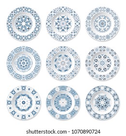 Set of decorative plates with a circular blue pattern, top view. White background. Vector illustration.