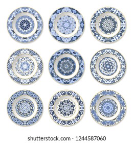 Set of decorative plates with a circular blue and gold pattern, top view. White background. Vector illustration.