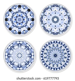 Set of decorative plates with a circular blue pattern, top view. White background. Vector illustration.