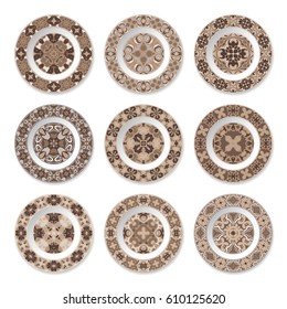 Set of decorative plates with a circular brown pattern, top view. White background. Vector illustration.