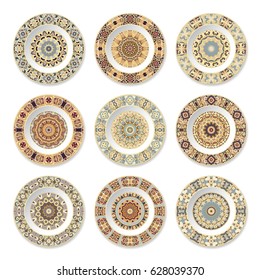 Set of decorative plates with a circular colorful pattern and gold contour, top view. White background. Vector illustration.