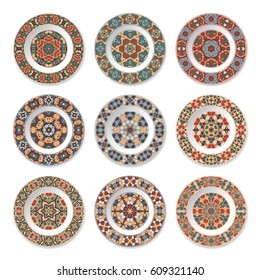 Set of decorative plates with a circular orange pattern, top view. White background. Vector illustration.