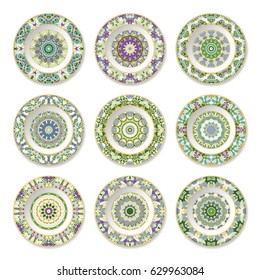 Set of decorative plates with a circular pattern and gold contour, top view. White background. Vector illustration.