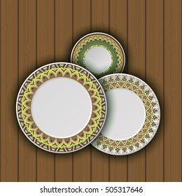 Set of decorative plates with a ethnic tribal ornament of handwork and an empty space in the center. Vector illustration.