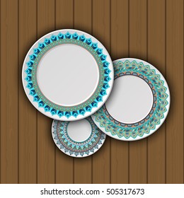 Set of decorative plates with a ethnic tribal ornament of handwork and an empty space in the center. Vector illustration.