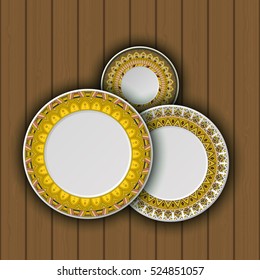 Set of decorative plates with a ethnic tribal ornament of handwork and an empty space in the center. Vector illustration.