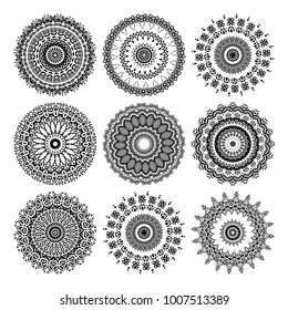 Set of a Decorative round Mandala ornament. Stylized black and white flowers. Floral motif. Complex flourish weave medallion. Vector illustration.