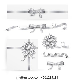 Set of decorative silver bows with ribbons. Vector illustration EPS 10. Isolated on transparent background