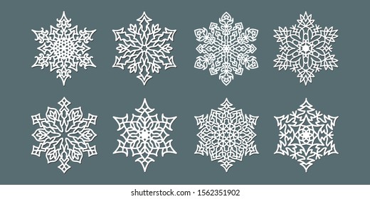 Set of decorative snowflakes laser cut template for New Year holidays.