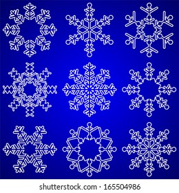 Set of decorative Snowflakes on a blue Background.